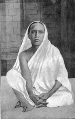 Manomohini Devi, mother of Sri Sri Thakur Anukulchandra, seated in a white sari
