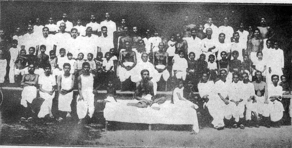 Group photograph of Sri Sri Thakur Anukulchandra with his mother Manomohini Devi, his brothers, his sons Amarendranath and Vivekranjan, and disciples at Himaitpur